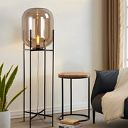 Industrial Floor Lamp with Standing Metal Base and Hand-Blown Glass Shade Luxe