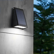 Modern Adjustable Solar Wall Sconce — Black ABS, LED, 90° Adjustable, Dual-Brightness, IP65 Weatherproof