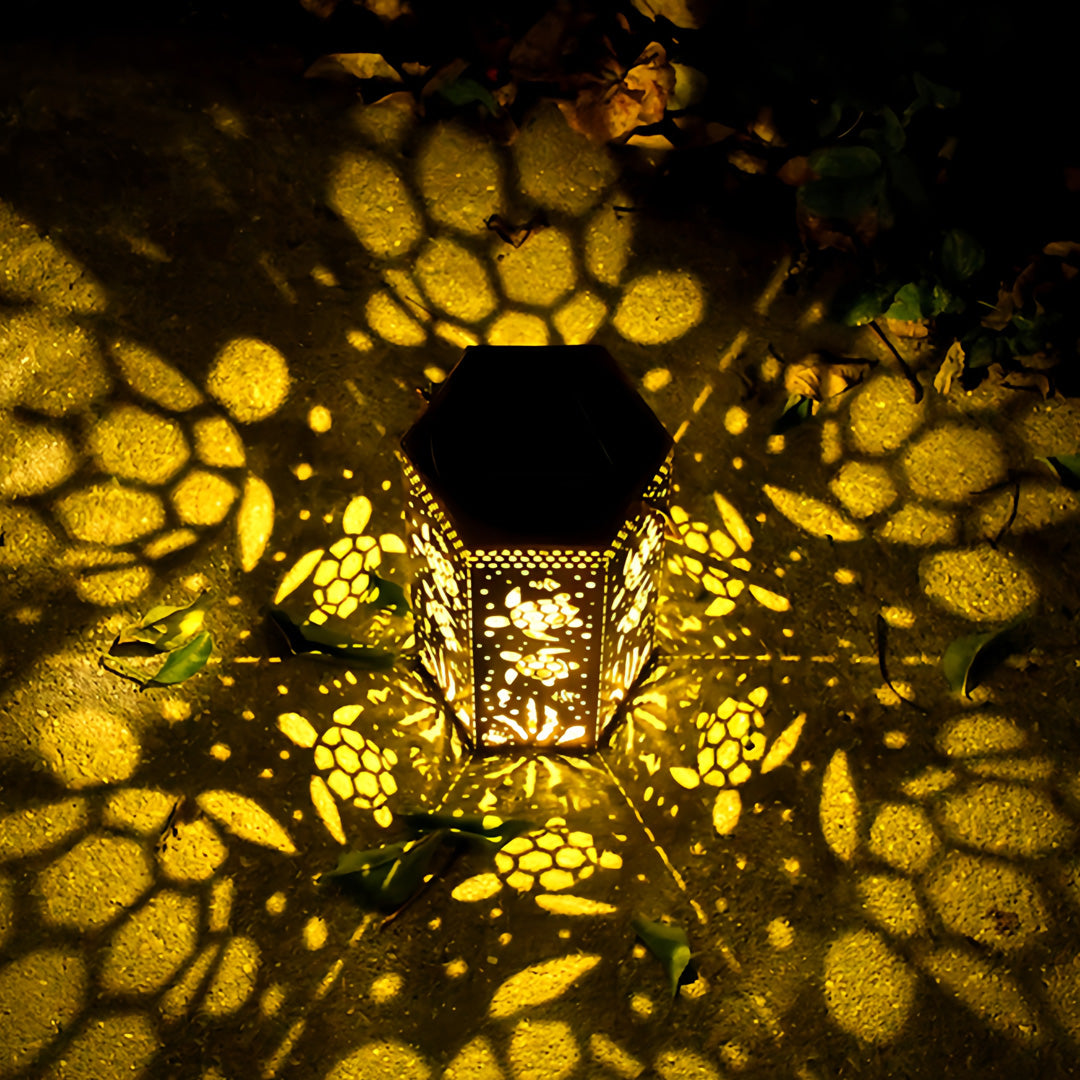 Hollow-Out Hexagonal Solar Outdoor Lantern — Copper-Red Wrought Iron, 0.5W Warm LED, IP44, 600mAh, Nature Motifs
