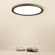 Industrial Flush-Mount Ceiling Light — Black or White Iron, LED, Three-Step Dimming, 12" or 16"