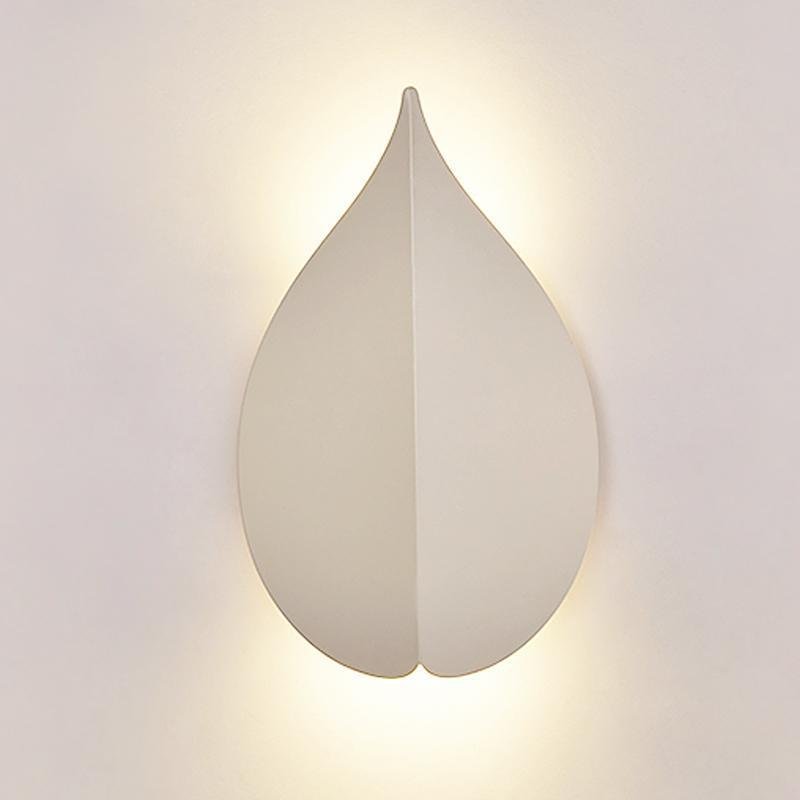 modern leaf shaped wall sconces in soft warm white