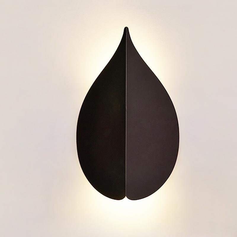 modern leaf shaped wall sconces in soft warm white