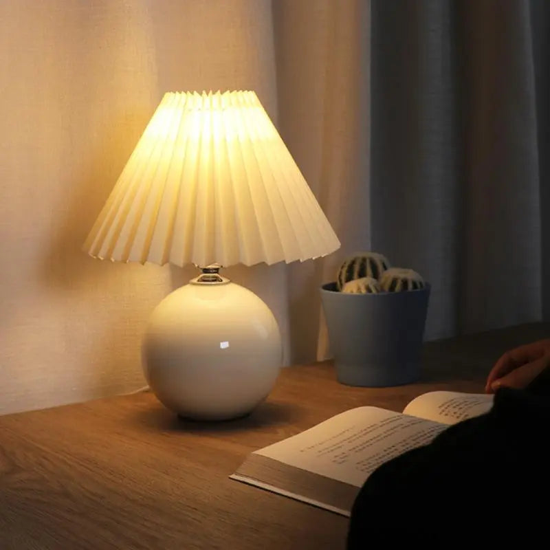 Contemporary White Ceramic Globe Table Lamp with Pleated Shade Luxe