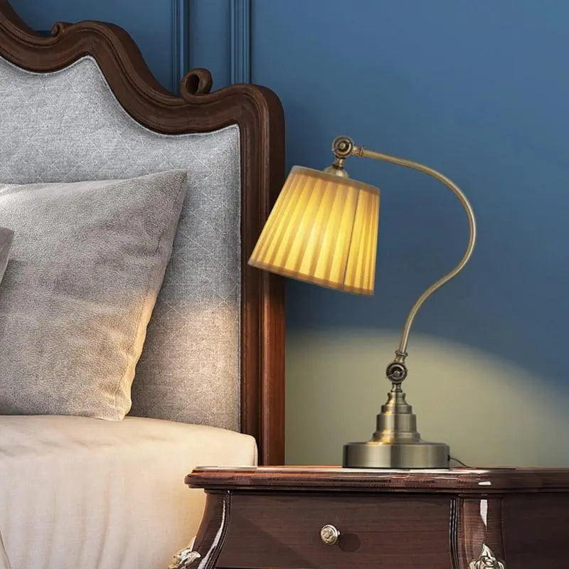 Empire-Style Metal Desk Lamp with Curved Arm and Adjustable Lighting for Industrial Spaces Luxe