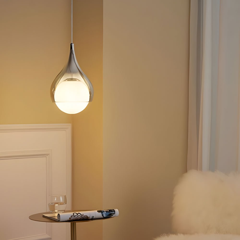 adjustable height modern teardrop glass pendant light with a single droplet