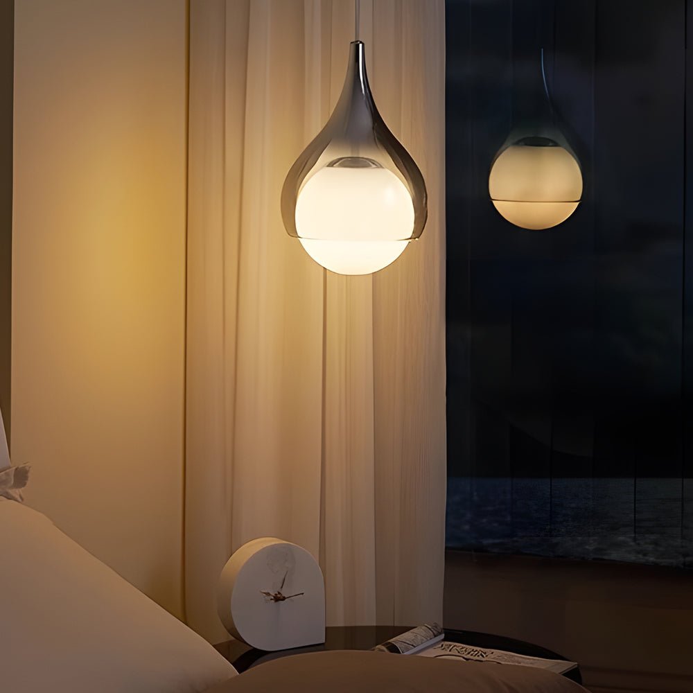 adjustable height modern teardrop glass pendant light with a single droplet