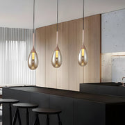 contemporary 1 light led pendant light with teardrop glass in amber and smoke gray