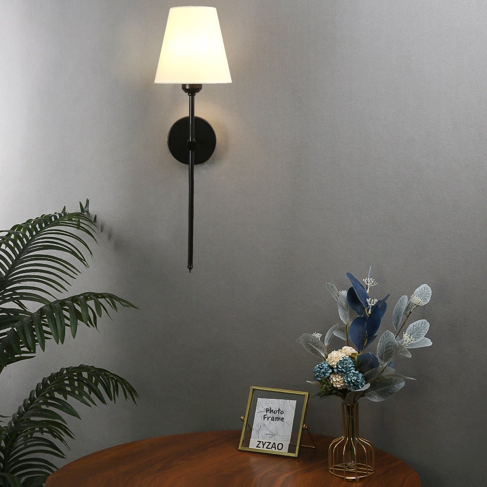 contemporary 1 light wall sconce in black and gold with white linen fabric shade