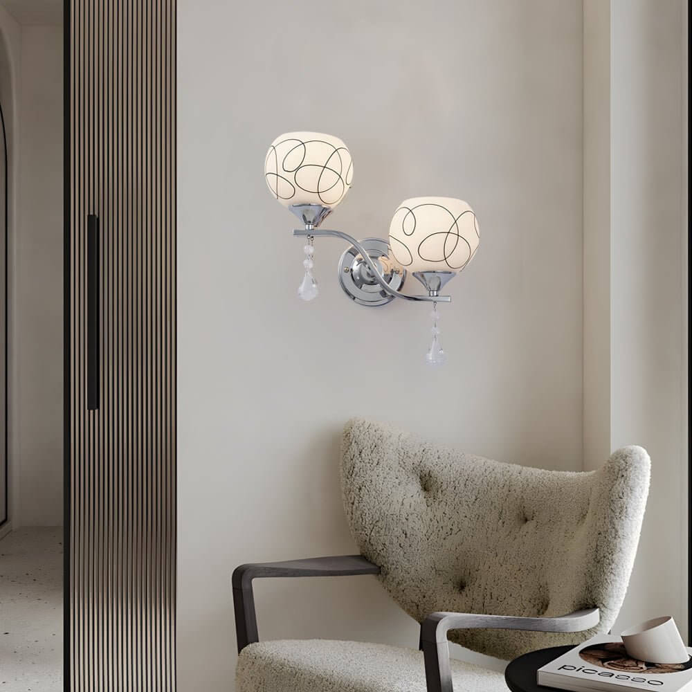 contemporary 2 light wall sconce in open sphere design with crystal pendants
