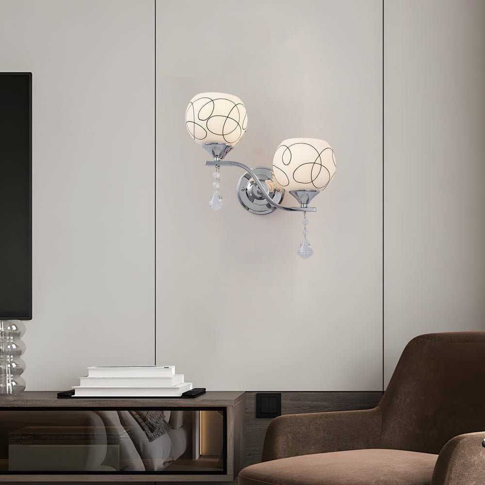 contemporary 2 light wall sconce in open sphere design with crystal pendants