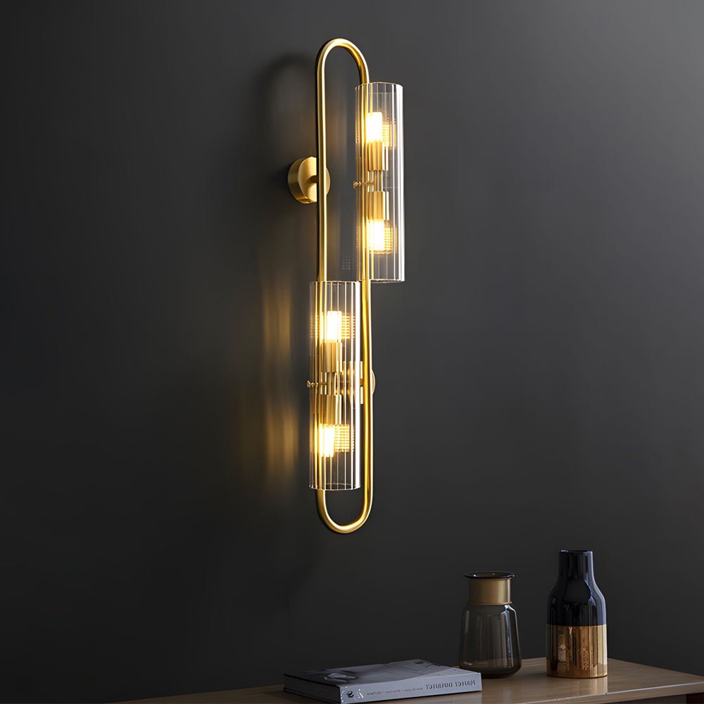 contemporary 4 light oval brass wall lamp with clear glass shade