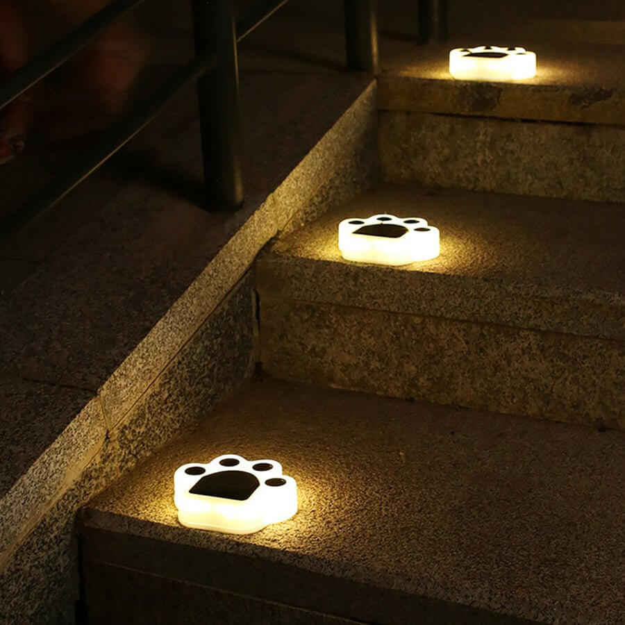 contemporary solar powered led animal paw lights for step and stair illumination