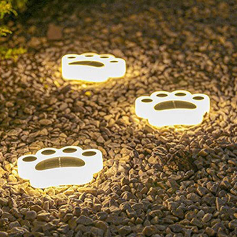 contemporary solar powered led animal paw lights for step and stair illumination