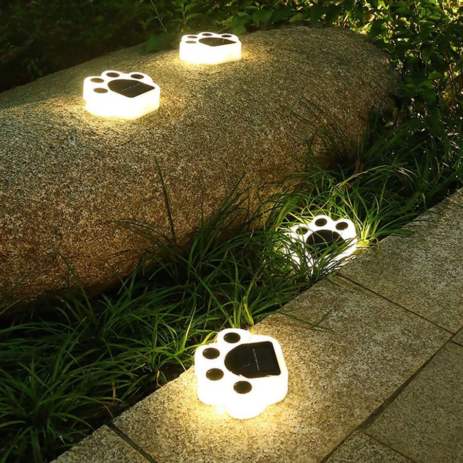 contemporary solar powered led animal paw lights for step and stair illumination