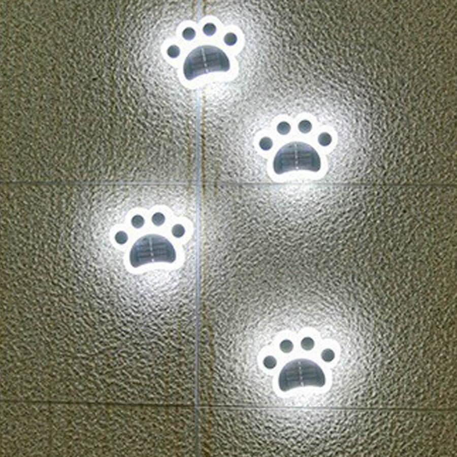 contemporary solar powered led animal paw lights for step and stair illumination