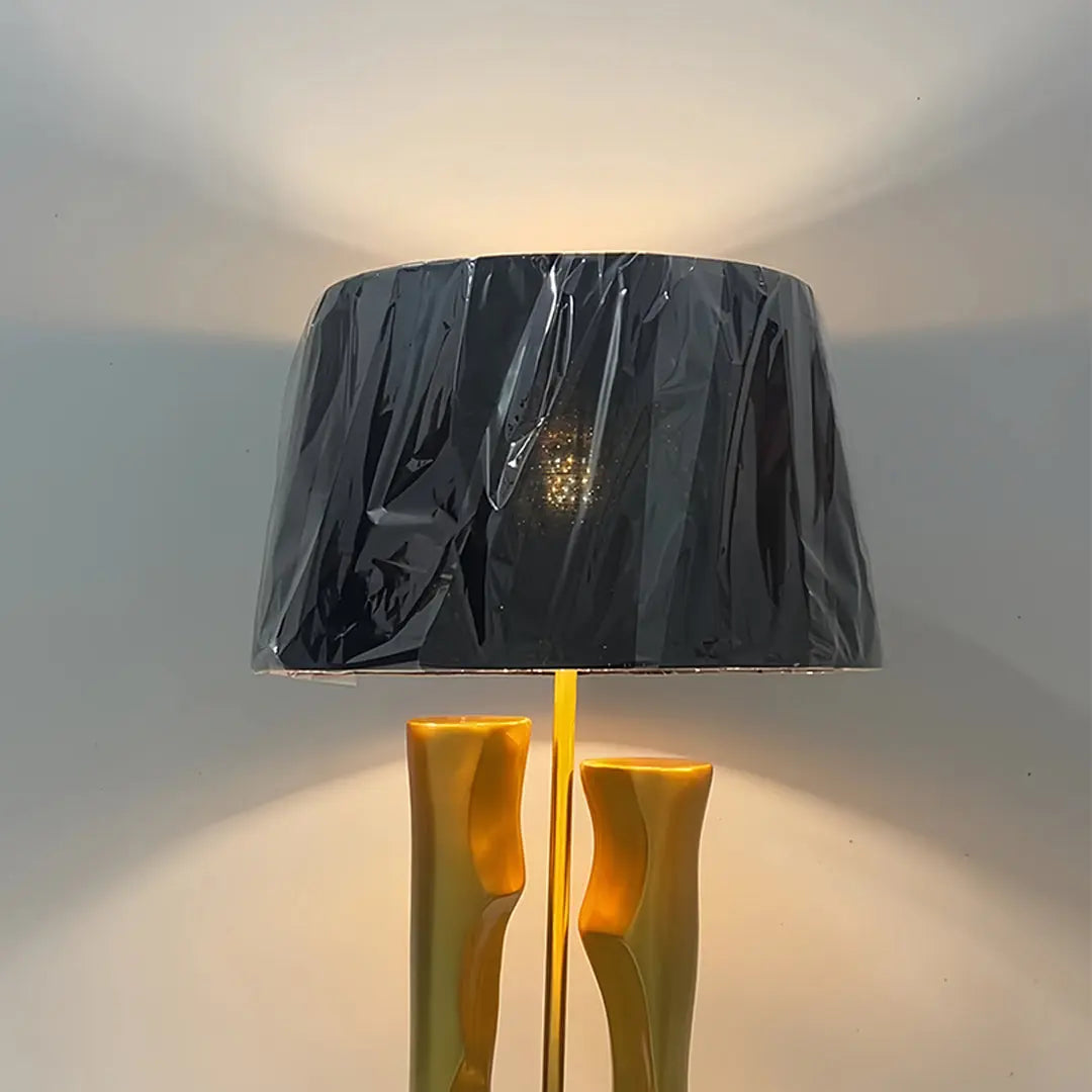 Elegant Drum Shade Lamp with Sculptural Gold and Black Base Luxe