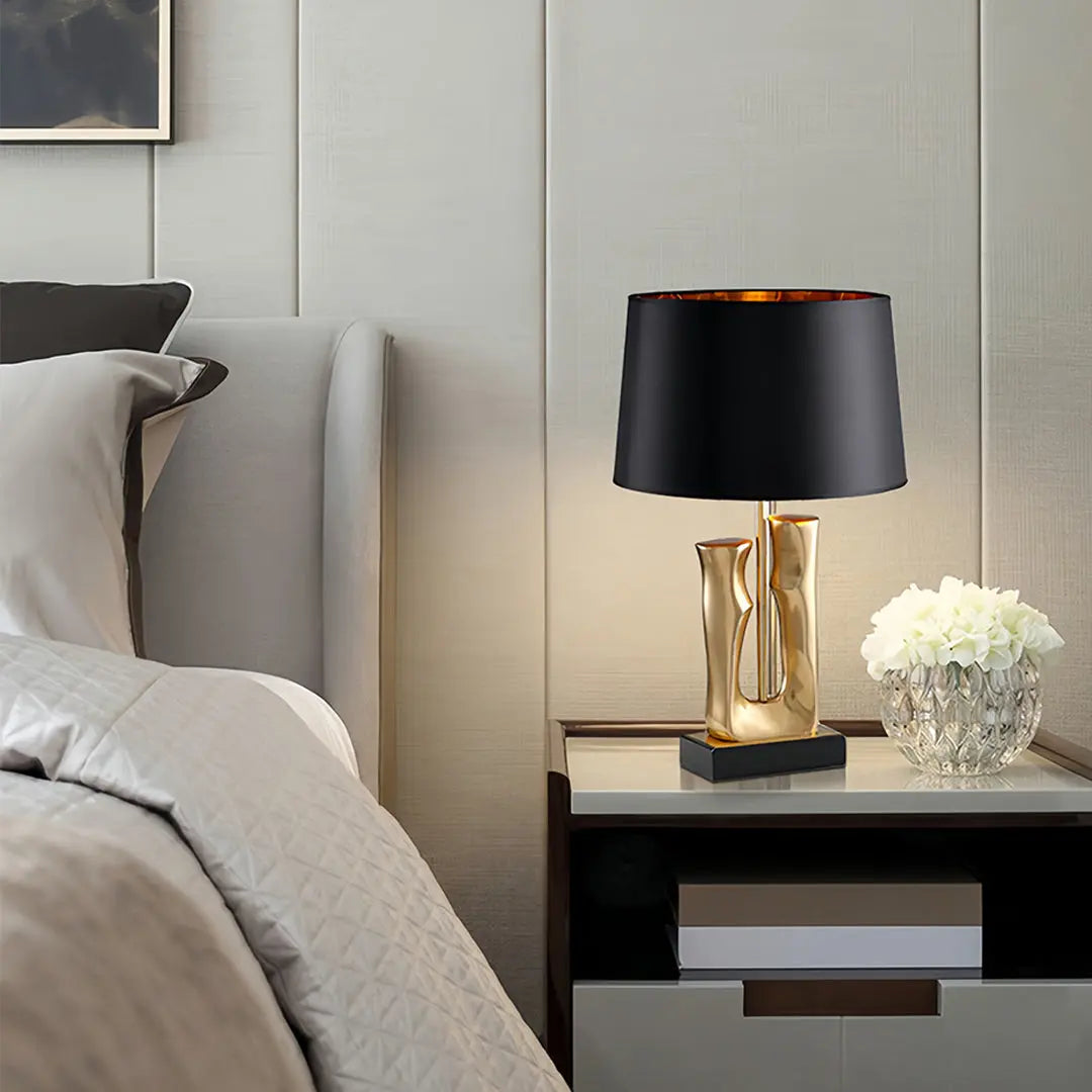 Elegant Drum Shade Lamp with Sculptural Gold and Black Base Luxe
