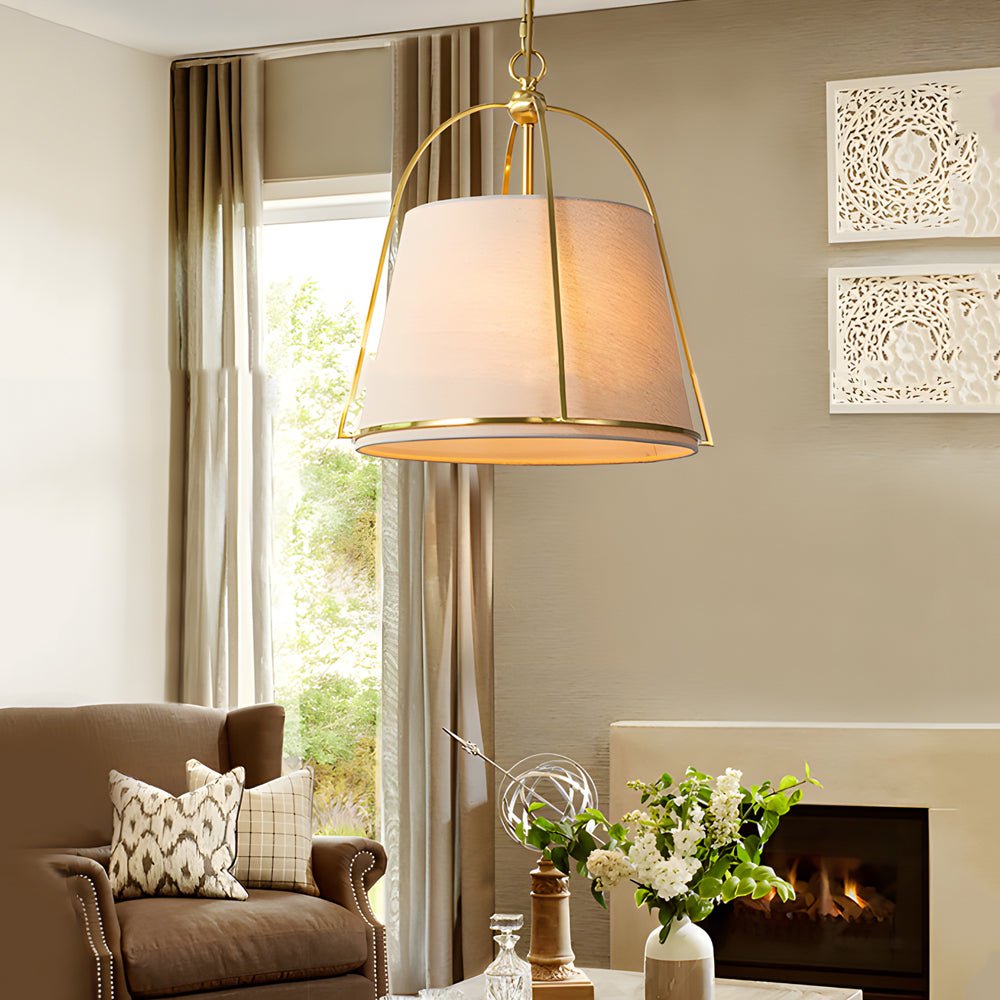 gold pendant fixture with white fabric shade 138 wide trapezoid design