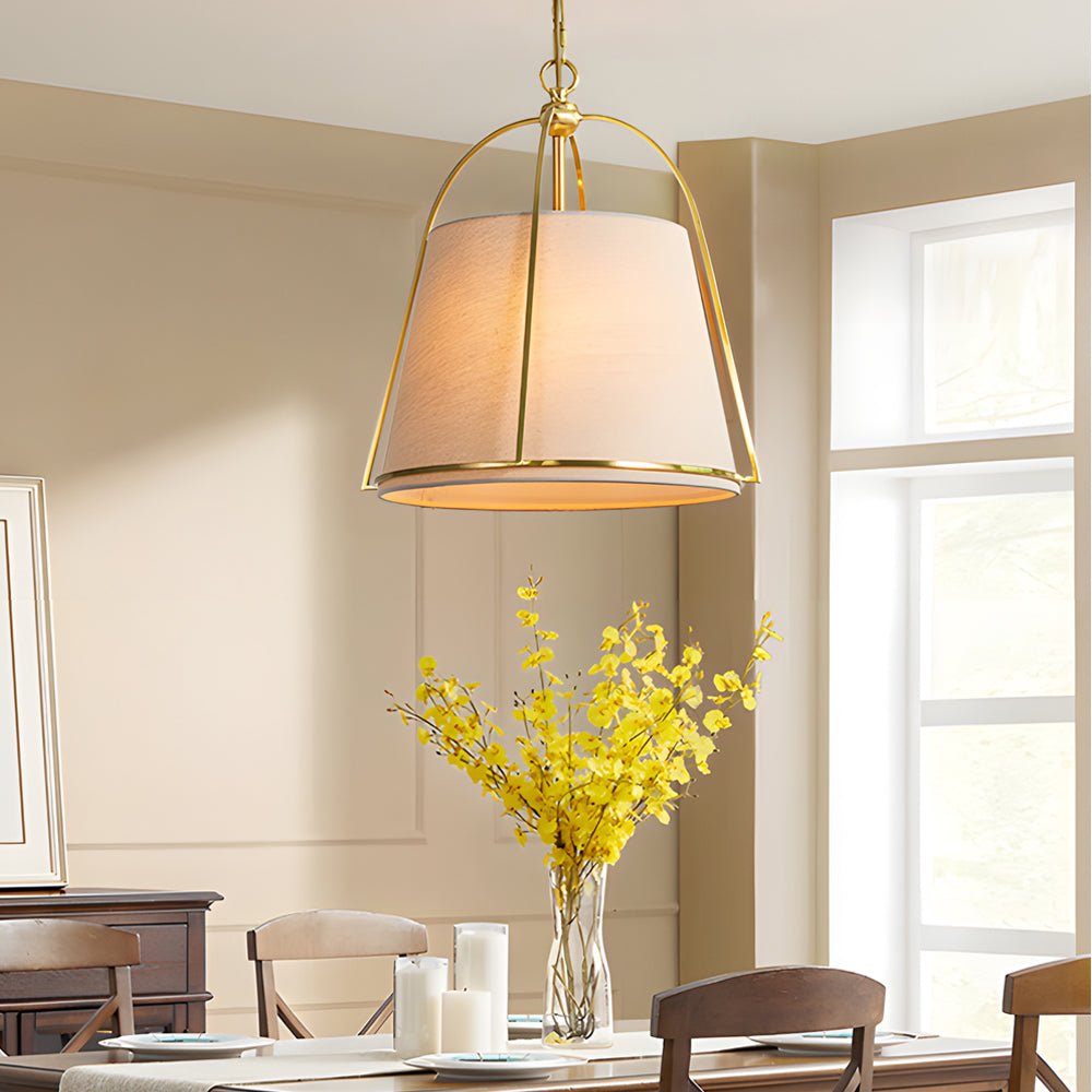 gold pendant fixture with white fabric shade 138 wide trapezoid design