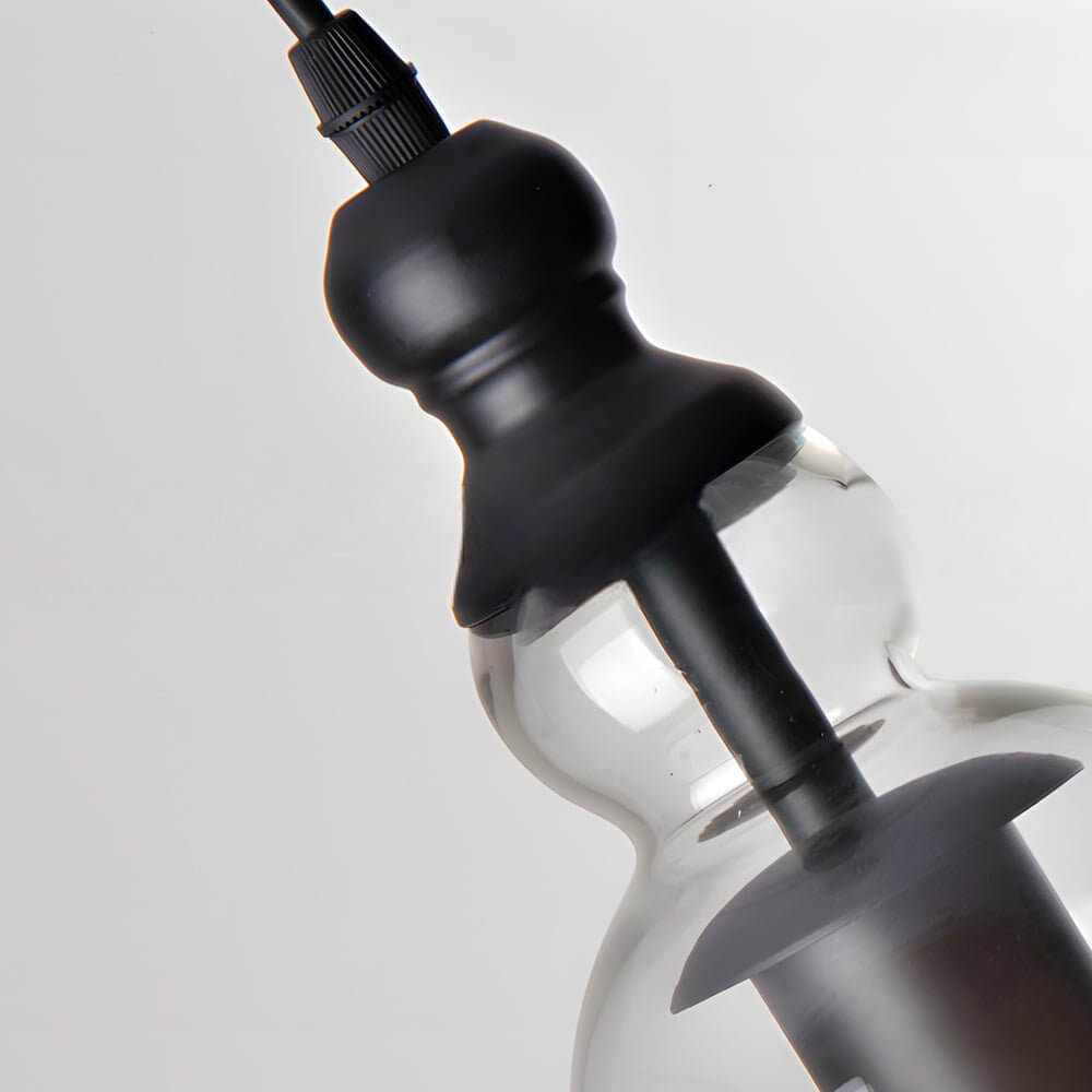 iron and glass pendant light inspired by vintage chimes