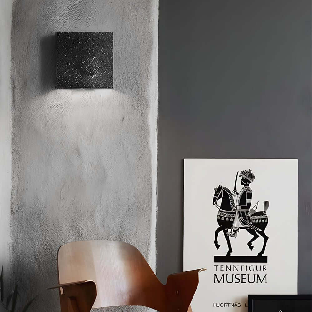 led wall light with frosted cement eclipse design