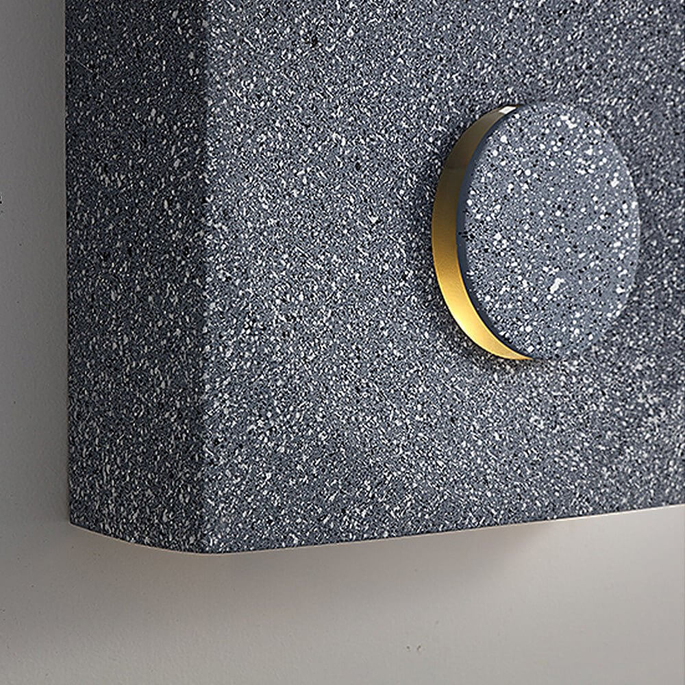 led wall light with frosted cement eclipse design