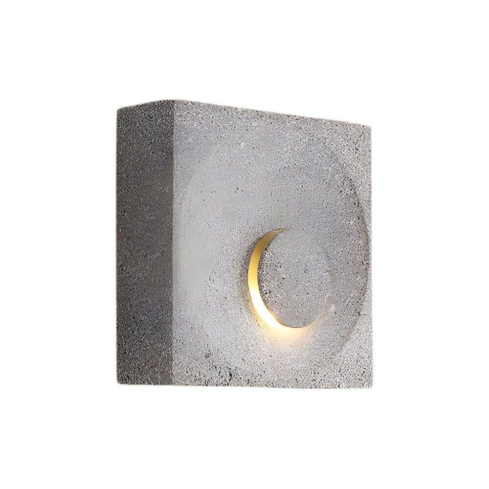 led wall light with frosted cement eclipse design