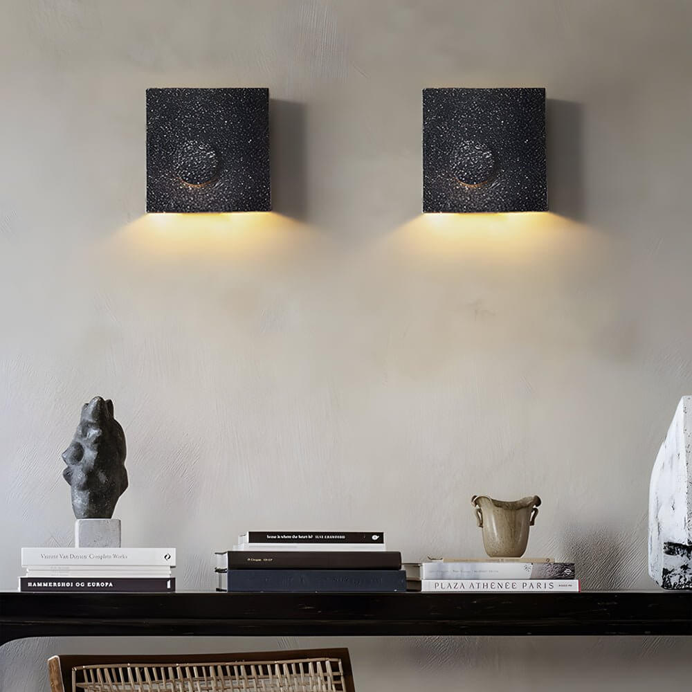 led wall light with frosted cement eclipse design