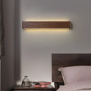 led wall sconce in linear walnut wood