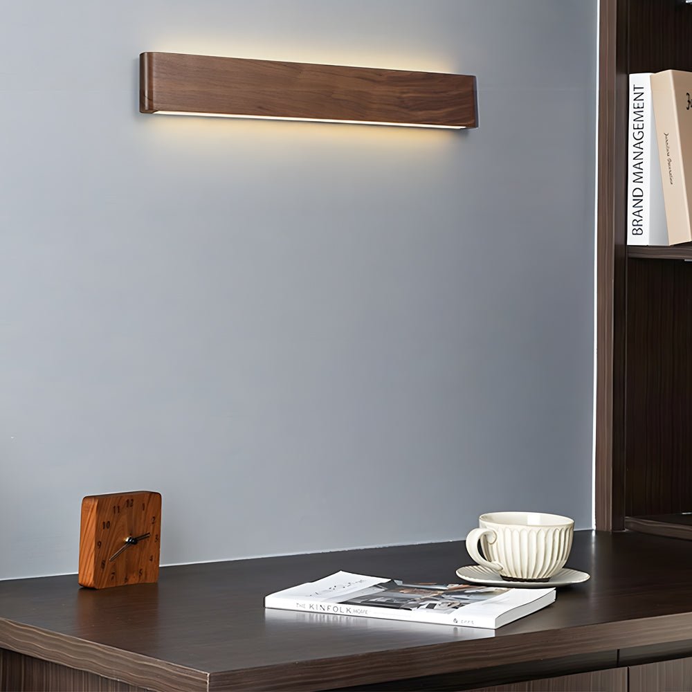 led wall sconce in linear walnut wood