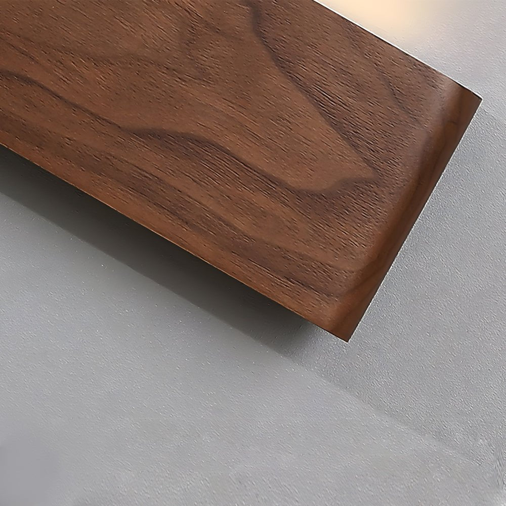 led wall sconce in linear walnut wood