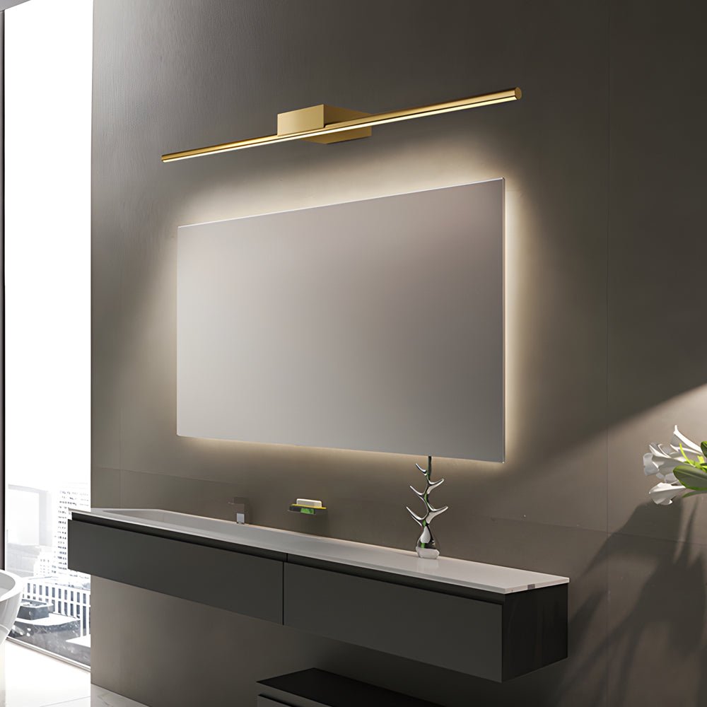 linear led vanity light in brushed brass with slim cylinder design for bathrooms