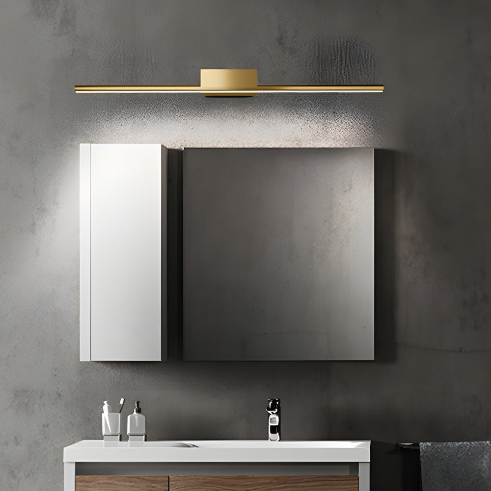 linear led vanity light in brushed brass with slim cylinder design for bathrooms