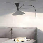 marseille swing arm wall lamp adjustable long metal arm trumpet sconce