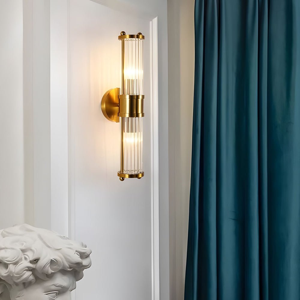 modern 12 light wall sconce in chrome and gold with clear cylinder glass shade