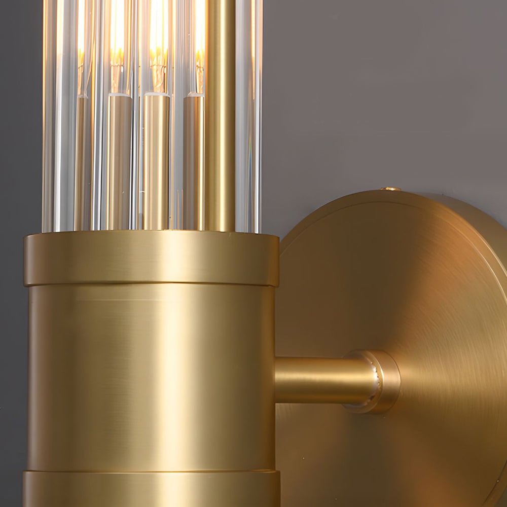 modern 12 light wall sconce in chrome and gold with clear cylinder glass shade