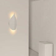 modern leaf shaped wall sconces in soft warm white