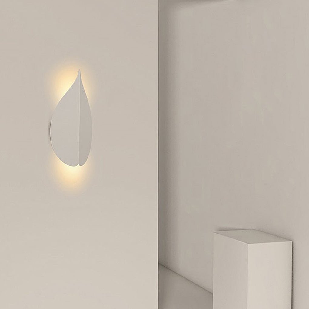 modern leaf shaped wall sconces in soft warm white