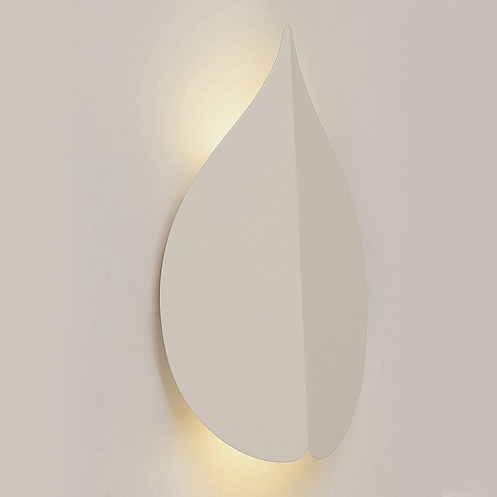 modern leaf shaped wall sconces in soft warm white