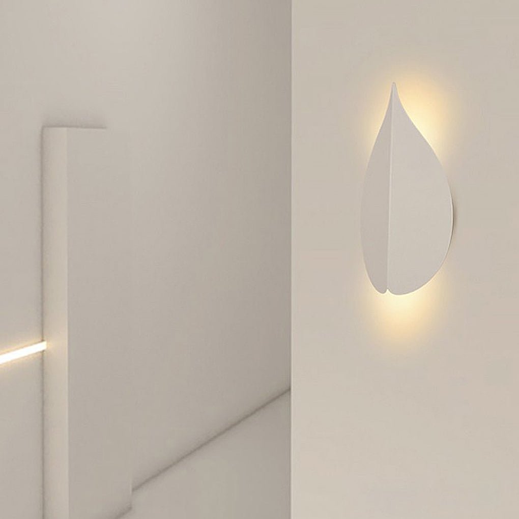modern leaf shaped wall sconces in soft warm white