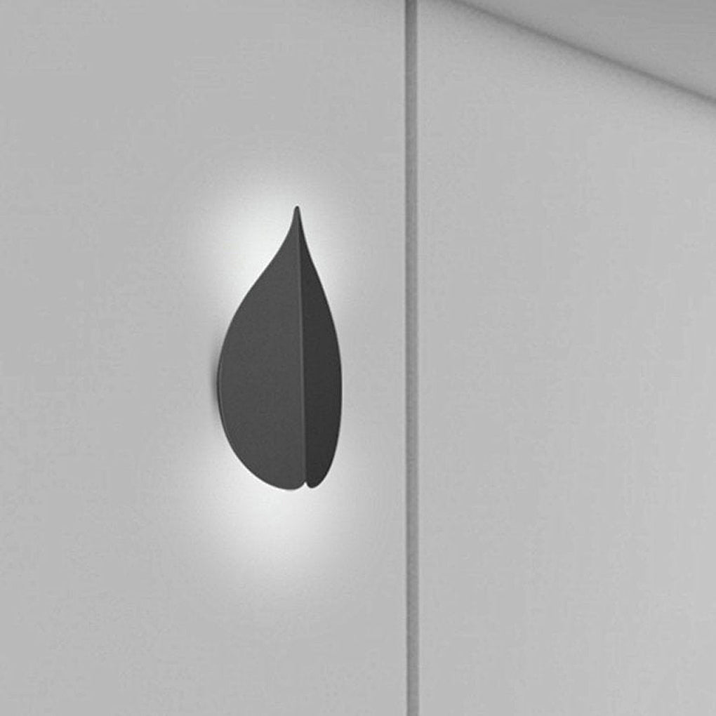 modern leaf shaped wall sconces in soft warm white