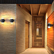 Modern Round Waterproof LED Up and Down Outdoor Wall Sconces in Black