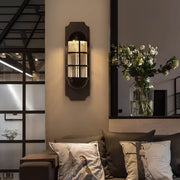 retro telephone booth inspired led sconce light with iron and glass design