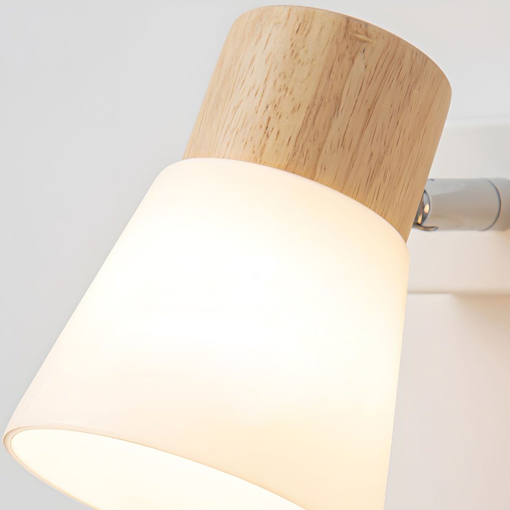 rotatable white wood and glass cone wall sconce