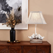 Fabric Light Table Lamp Featuring a Small Bird Perched on Stacked Books Luxe